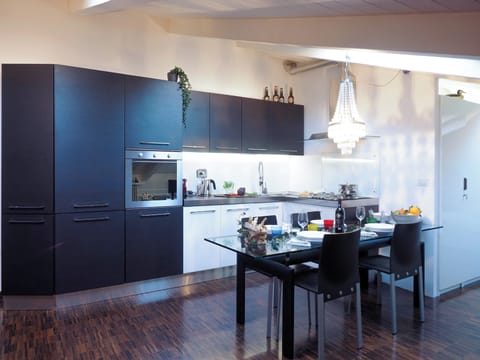 Apartment | Private kitchen | Espresso maker, electric kettle, dining tables