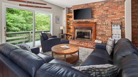 Living room with wood burning fireplace 