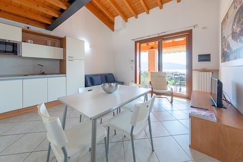 Apartment, Pool View | In-room dining