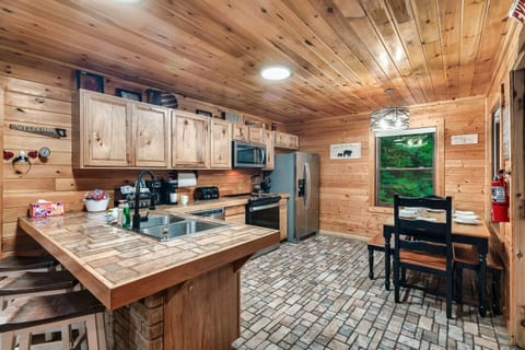 Fully equipped kitchen and dining area, with all the comforts of home.