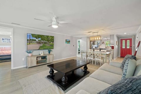 Gather in the spacious living room, perfect for college football fans! With plenty of seating and a large TV, it’s the ideal spot to watch the game, cheer on your team, and enjoy a fun, lively atmosphere.