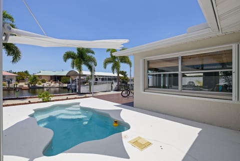 Gorgeous heated pool overlooking canal