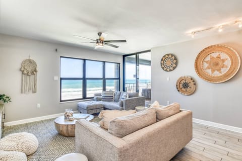 Welcome to Sand Dollar 306, a beachfront condo where modern coastal decor and amazing views can be enjoyed throughout!
