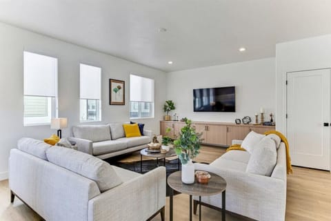 Living areaBright living room with comfy couches and a warm, relaxed vibe for gathering together.