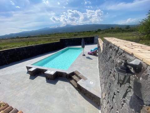 Outdoor pool, open 11:00 AM to 7:00 PM, pool umbrellas, sun loungers