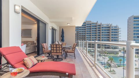 The well furnished balcony with breathtaking views of the beach, malecon, and resort amenities.