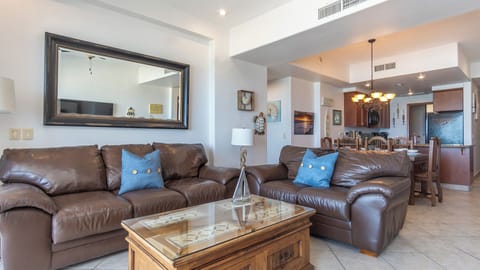 Leather sofas in living room add a sophisticated touch.
