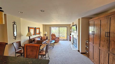 Kitchen counter, dining table and living room