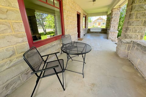 Enjoy your morning coffee or an evening meal out on the front porch!