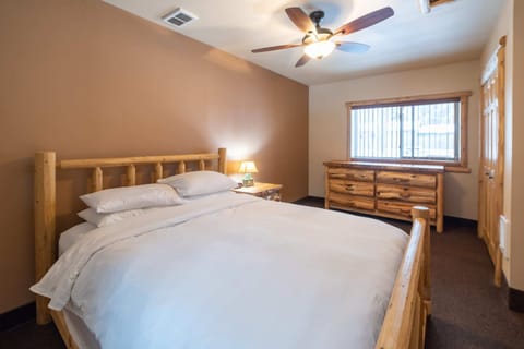 Northern Michigan themed furniture. Log queen sized bed, log dresser.