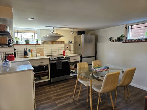 Our charming kitchen gets lots of natural light on sunny days! 
