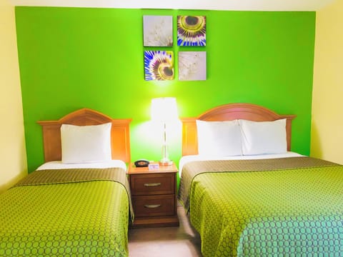 two room suite with 1 Queen Bed, 1 Twin Bed and 1 Sofa Bed | 1 bedroom, desk, laptop workspace, iron/ironing board
