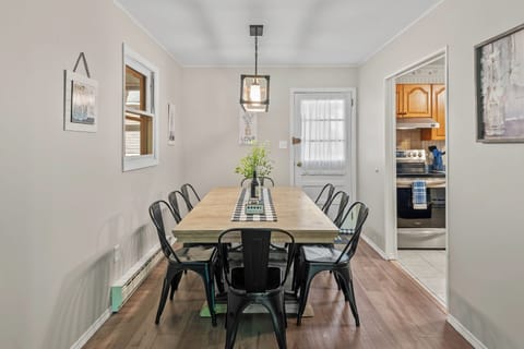 Gather around for delicious meals and great conversations at our dining table.