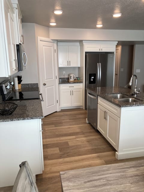 large fridge, pantry and coffee/tea station