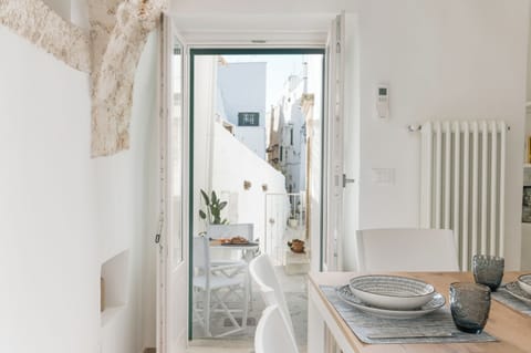 Apartment, Sea View | Private kitchen | Highchair, cookware/dishes/utensils