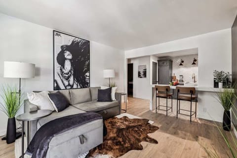 Warm and cozy living room featuring a Smart TV for entertainment and designer furnishings.