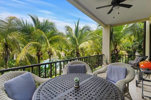 L309 has a beautiful terrace that overlooks the pool but has swaying palms in front to create privacy.