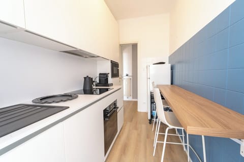 Apartment, Sea View | Private kitchen | Espresso maker, electric kettle, toaster, highchair