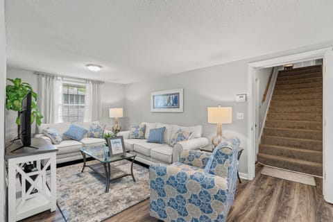 This comfy living room offers space for everyone to gather!