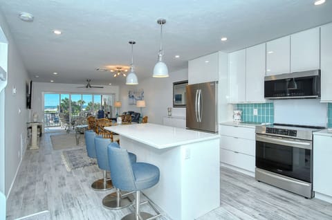 Kitchen Area - Look through - new flooring throughout