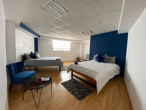 Superior Quadruple Room, City View | Desk, laptop workspace, free WiFi