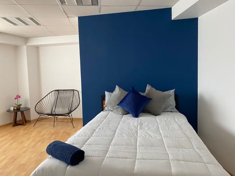 Superior Quadruple Room, City View | Desk, laptop workspace, free WiFi