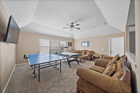 Game room with air hockey and ping pong