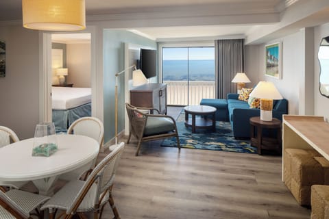 Race Point Waterfront Suite | Living area | 55-inch flat-screen TV with cable channels, TV