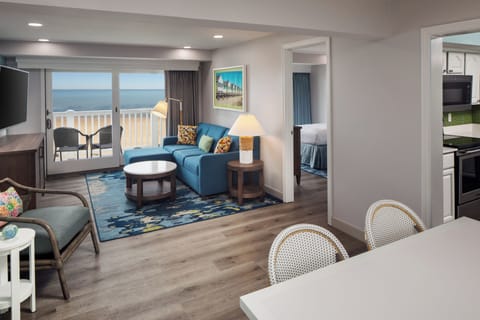 Deluxe Apartment, 2 Bedrooms, Beach View | Living area | 55-inch flat-screen TV with cable channels, TV