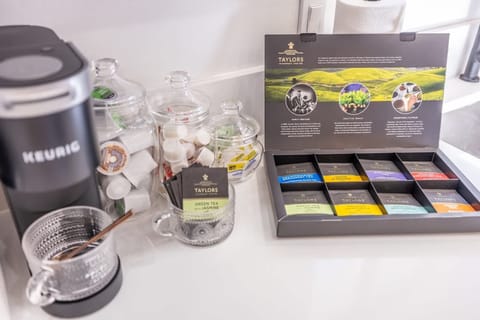 Kickstart your morning or unwind in the evening at our beautifully curated coffee and tea bar! Choose from an array of premium Taylor’s teas or a fresh Keurig brew for the perfect cup, every time.