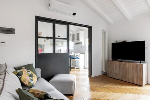 Apartment | Living area | 35-inch flat-screen TV with digital channels