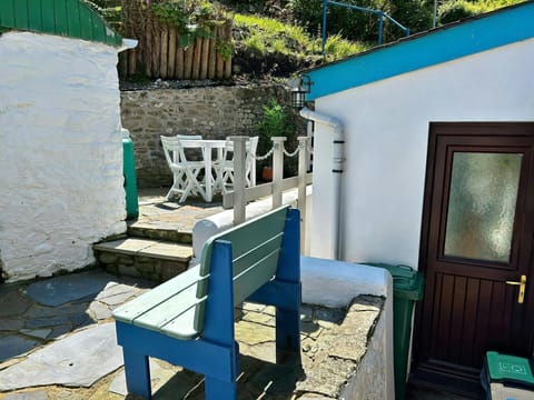 Patio and picnic bench, circular table with four chairs