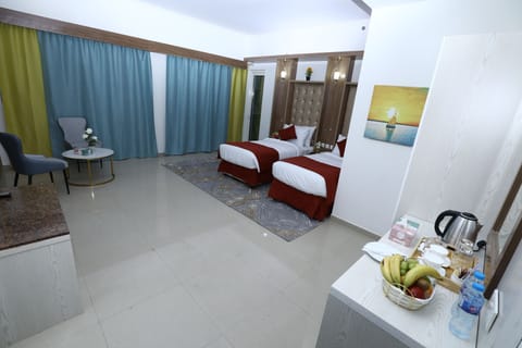 Deluxe Room | Hypo-allergenic bedding, desk, iron/ironing board, free WiFi