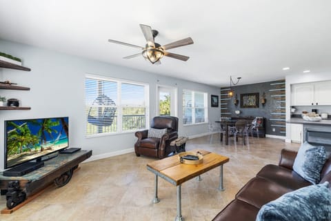 Open living room with large TV and fantastic views