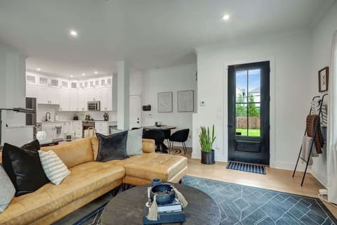 Perfect for bonding, our open-concept living room and kitchen keeps everyone close.