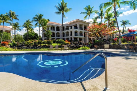 Outdoor pool, open 7:00 AM to 10:00 PM, pool umbrellas, sun loungers