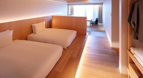 [Terrace Bath Premium Twin] 50m² / bed width 1,200mm + sofa bed. A spacious and relaxing bed space.