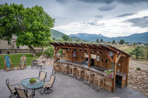 The backyard highlights a great space for everyone to hang out together