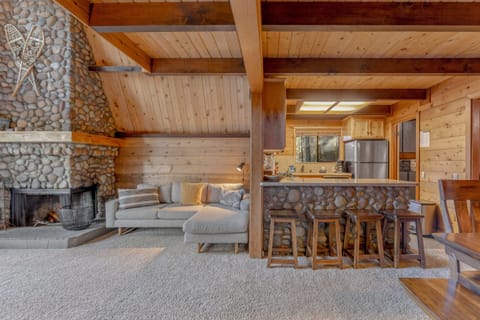 Main floor: Open layout with kitchen, living room, and dining room