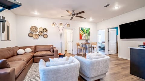 Kick back in a stylish, open-concept living space designed for comfort and connection. Whether you're debriefing after a Rangers game, watching pre-game coverage on the smart TV, or just relaxing with your crew—The Ryan's living area has you covered.