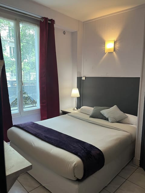 Desk, laptop workspace, free WiFi, bed sheets