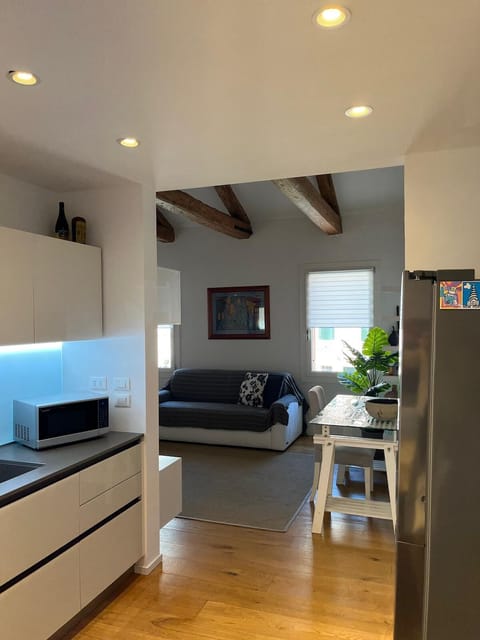 Comfort Apartment, Canal View | Living area | 50-inch Smart TV with digital channels