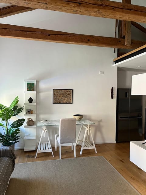 Comfort Apartment, Canal View | Living area | 50-inch Smart TV with digital channels