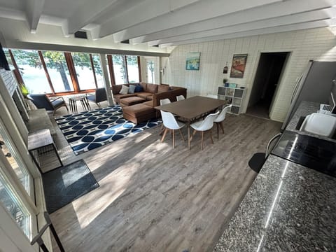 Open concept kitchen, dining and living space.