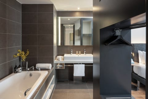 Interconnecting Townhouse | Bathroom | Shower, rainfall showerhead, eco-friendly toiletries, hair dryer