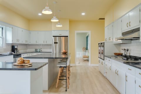 Enjoy meals together with ample space and added stools in our kitchen.
