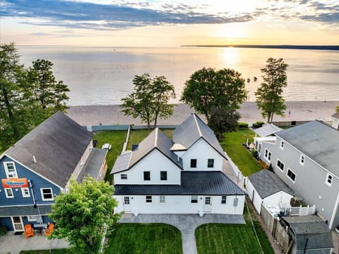 Exterior shot of the property, showcasing its architectural style and landscaped surroundings.