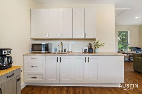 Everything you really need: Kitchenette with dining, microwave, coffee, and the basics