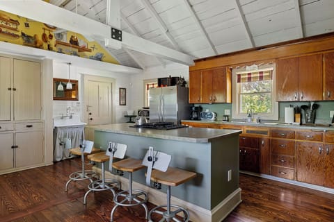 Whipping up memories in this charming kitchen! Come for the food, stay for the warmth.