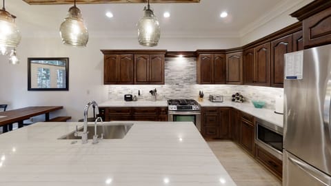 Indoors, Kitchen, Cooktop, Floor, Refrigerator